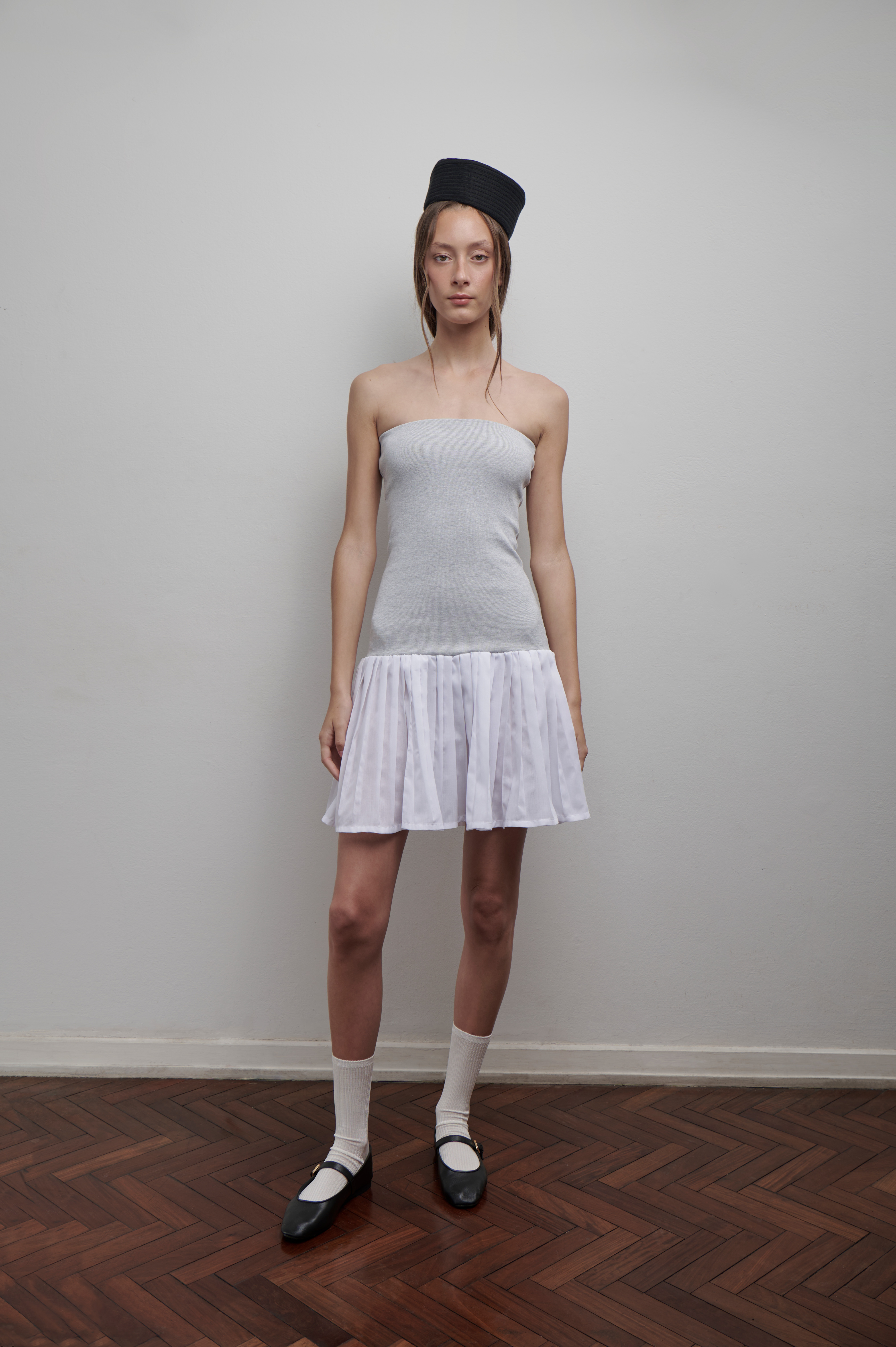 Vestido top con falda plisada