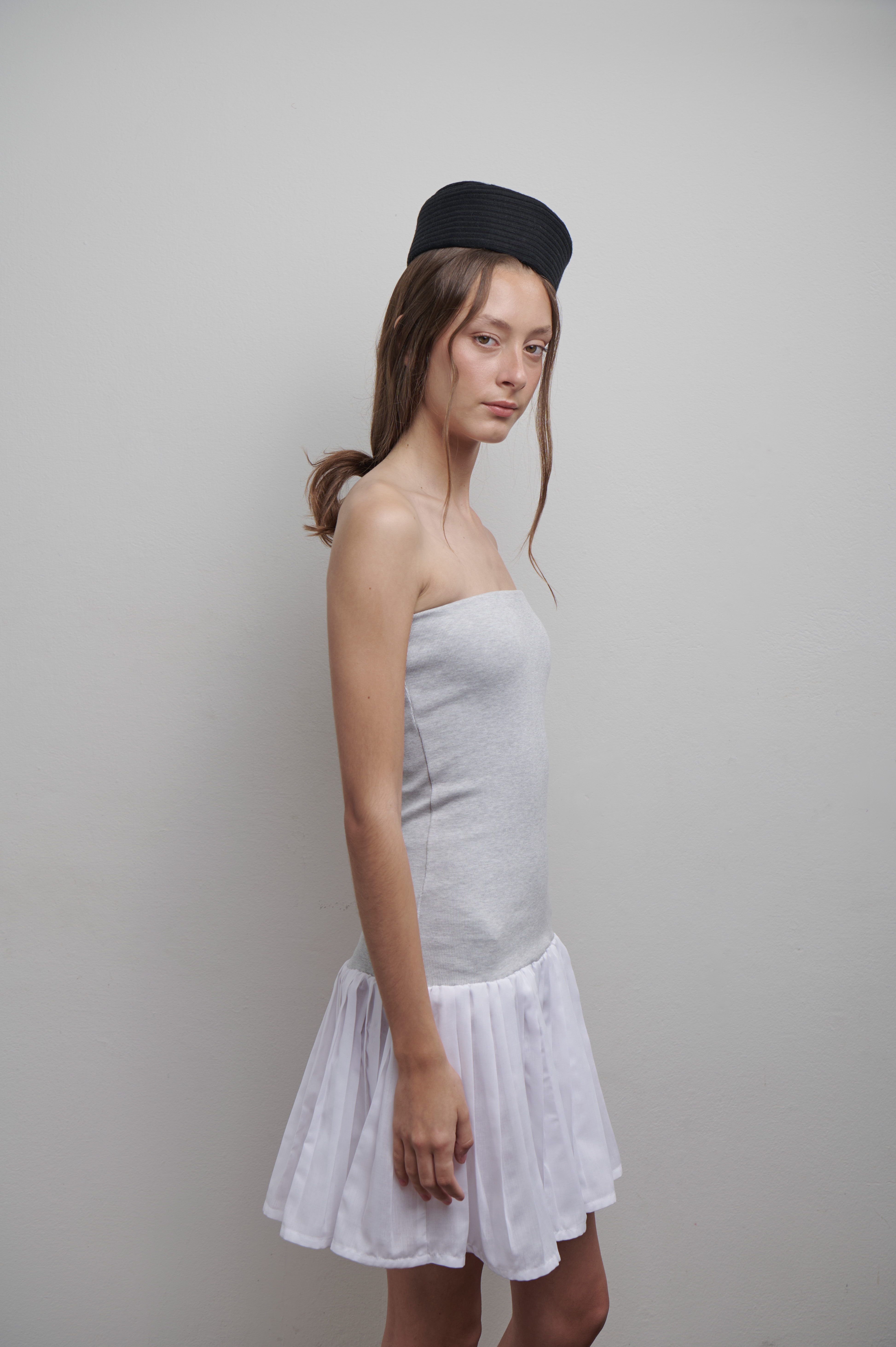 Vestido top con falda plisada